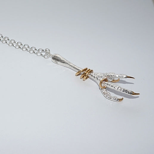 Sterling Silver Kestrel Bird Claw with gold bangles and nails Pendant