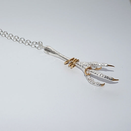 Sterling Silver Kestrel Bird Claw with gold bangles and nails Pendant